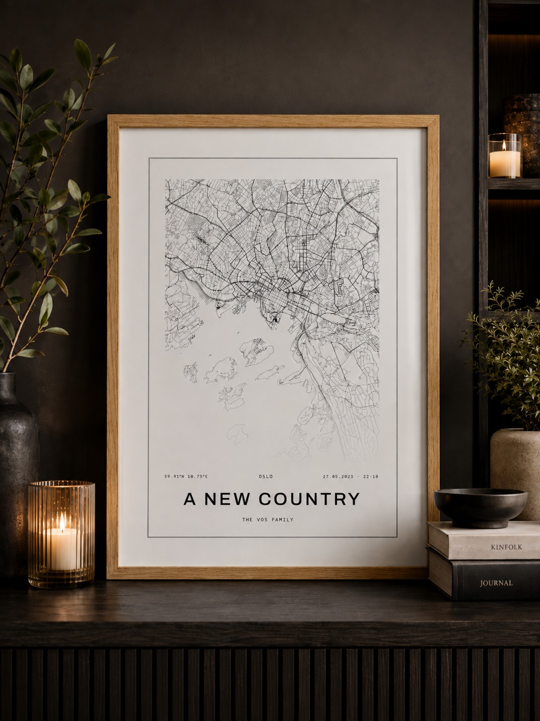 Framed light street map print of Oslo in an oak frame